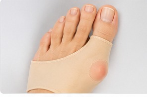 A silicone bunion pad worn over the big toe joint.